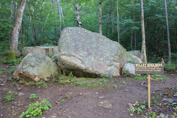 solid outcropping of boulders above Willie`s house