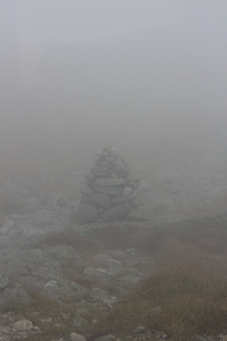 Cairns in the fog on Mount Washington