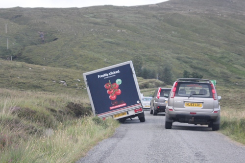 A truck stuck on the smaller road