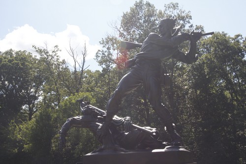 Soldier defending his fallen comrade